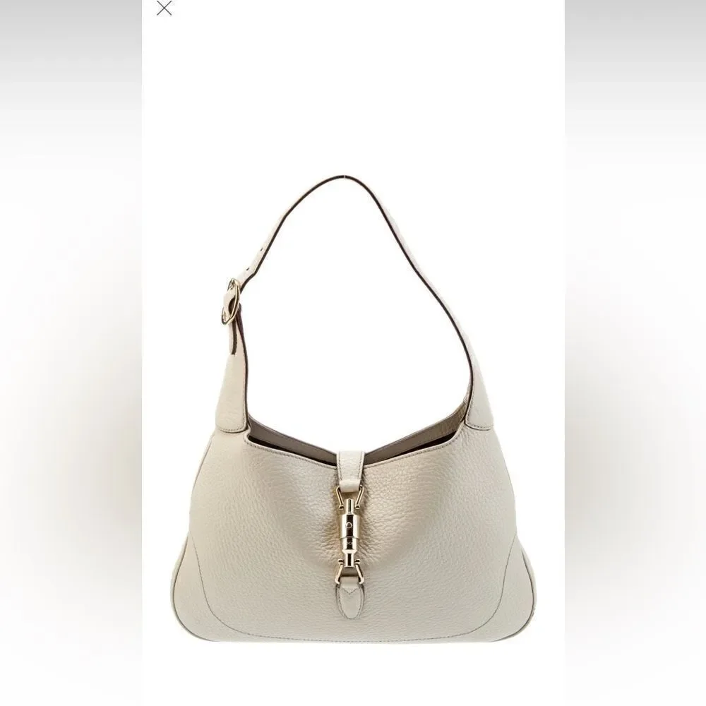 Gucci beiges leather Jackie bag with silver piston lock